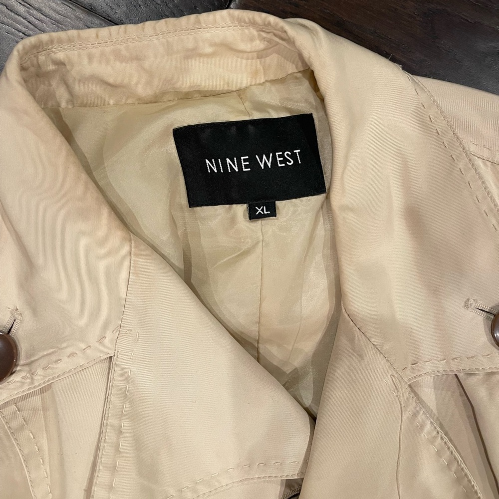 Nine West women’s trench coat - smooth and light weight. Not stiff